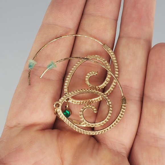 Spiral Green Goldtone Earrings and Cross Black And Green Bracelet - Picture 7 of 12